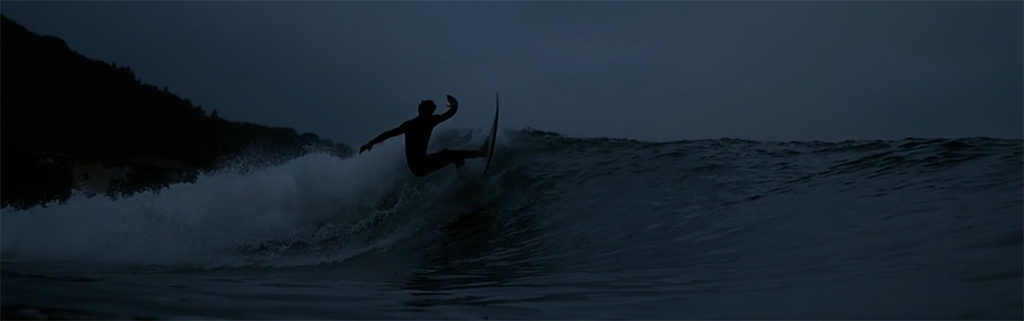 ION Wetsuits On Dark Surfing