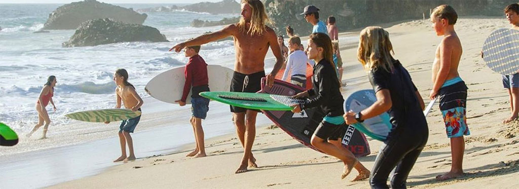 Exile Skimboards Running On The Sand